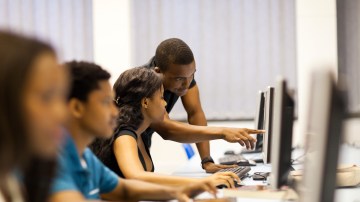 african american college students in computer room